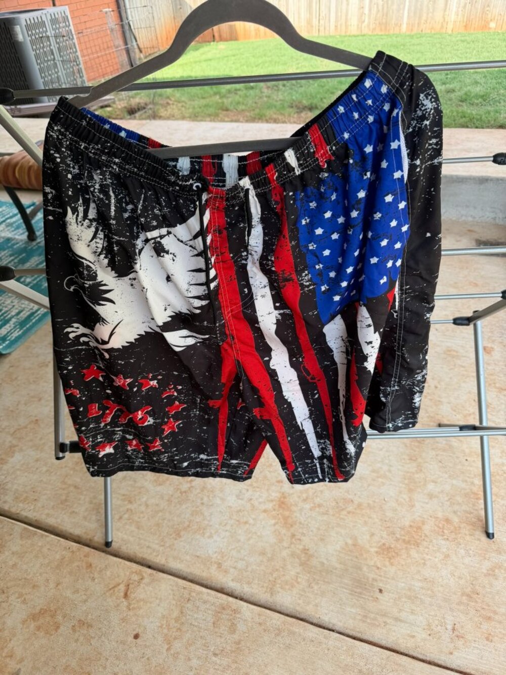 FT Fenteng men's patriotic swim trunks featuring a distressed American flag and
